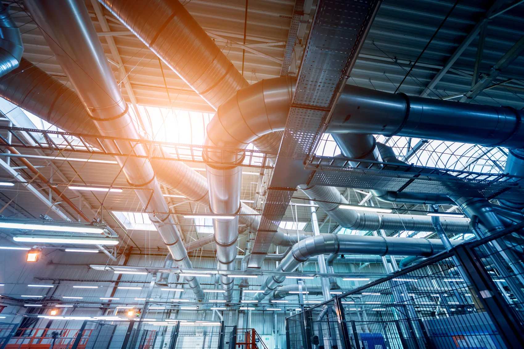 Ductwork carrying conditioned air through a building